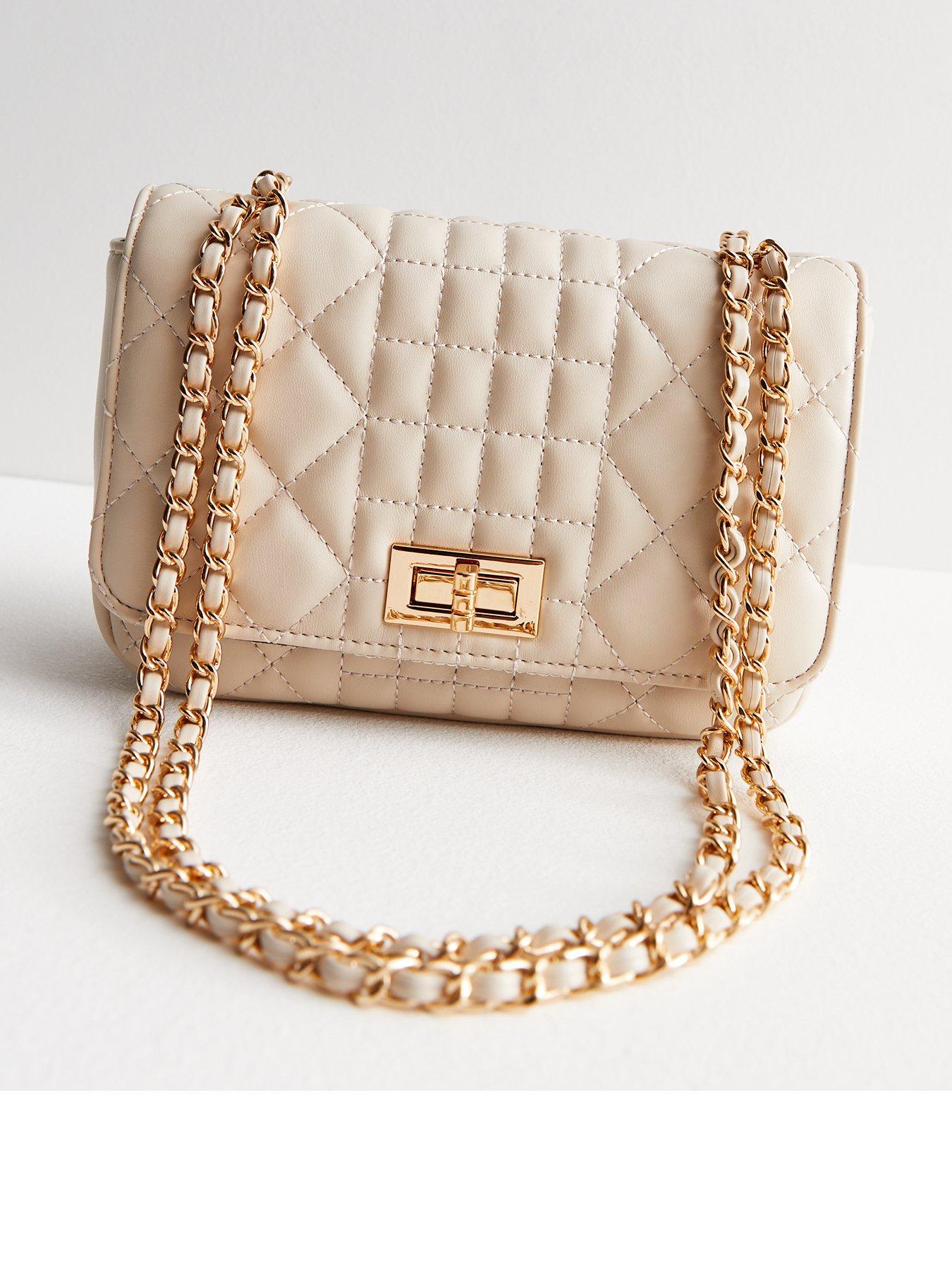 Cream quilted online handbag