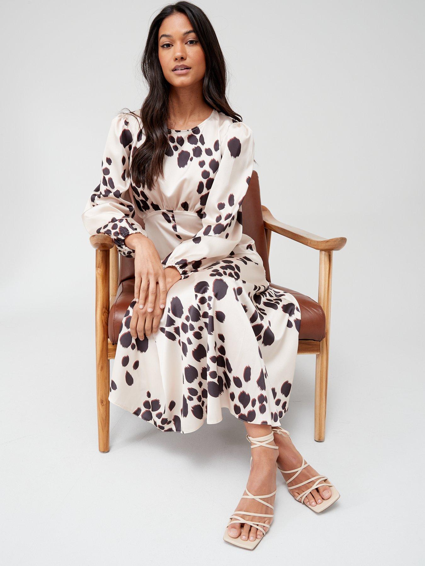 Cream dress 2024 with black spots