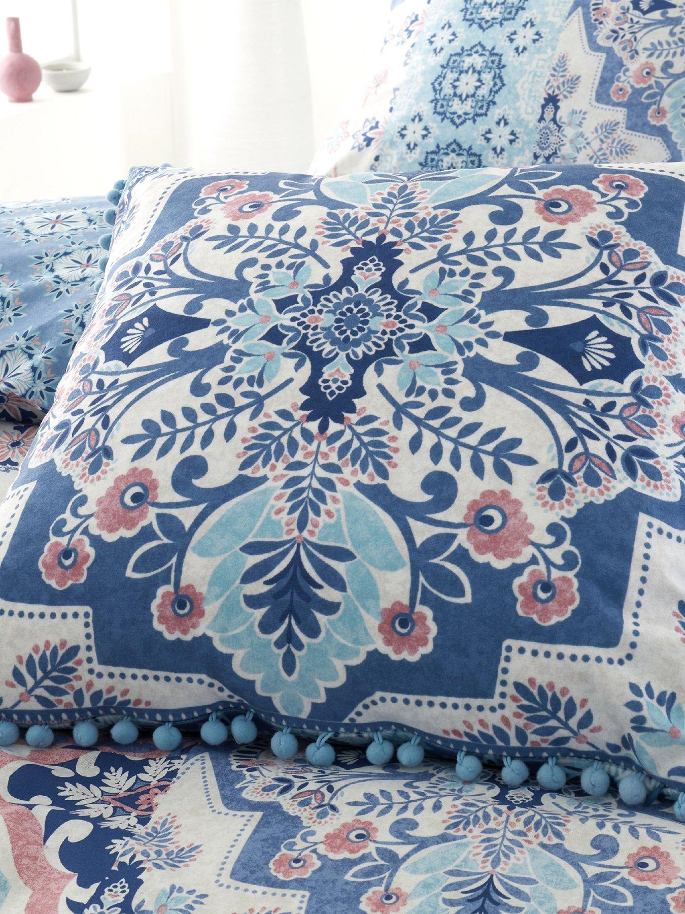 Product photograph of Catherine Lansfield Boho Patchwork Filled Cushion - Blue from very.co.uk