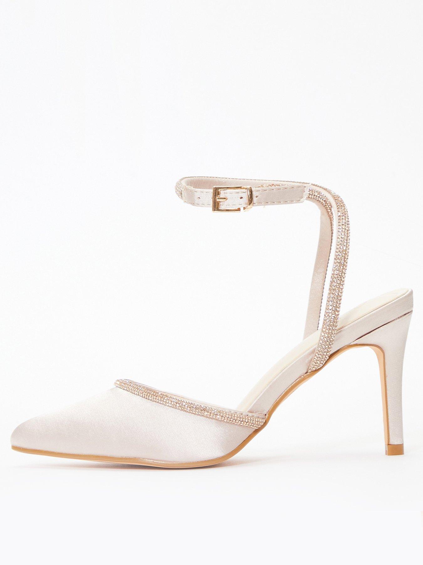 Quiz cross strap clearance low heeled courts