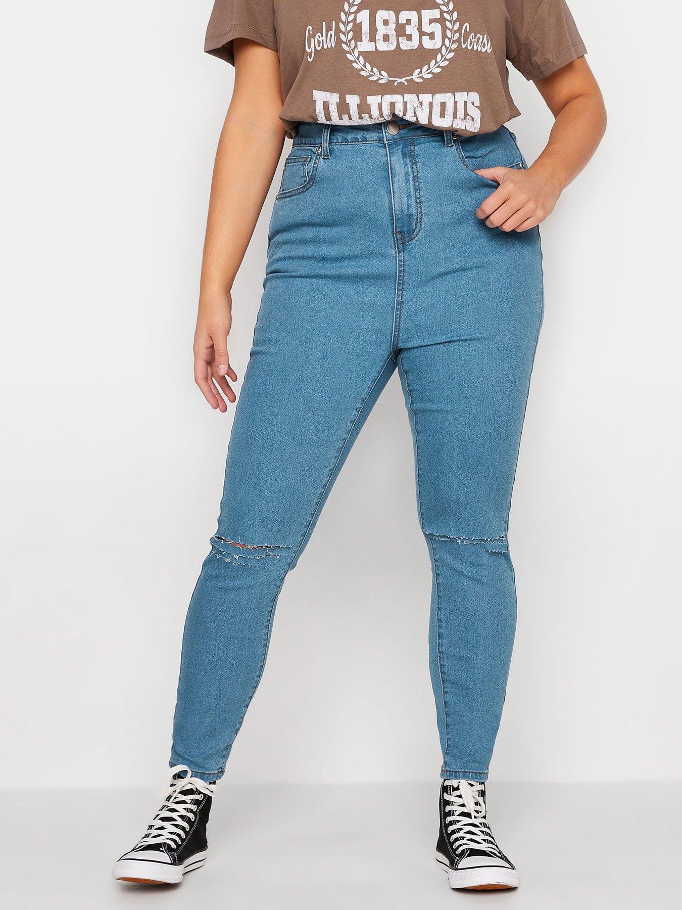 Ripped mid best sale rise jeans