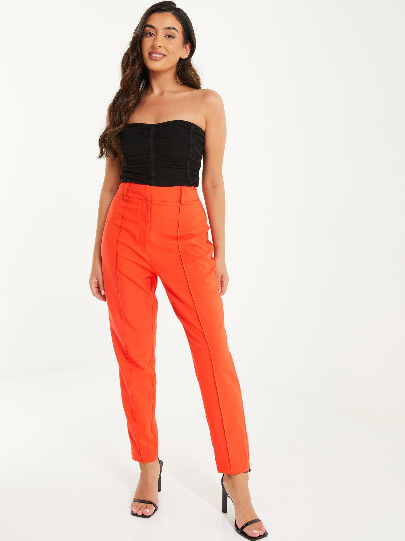 Orange paper bag on sale trousers