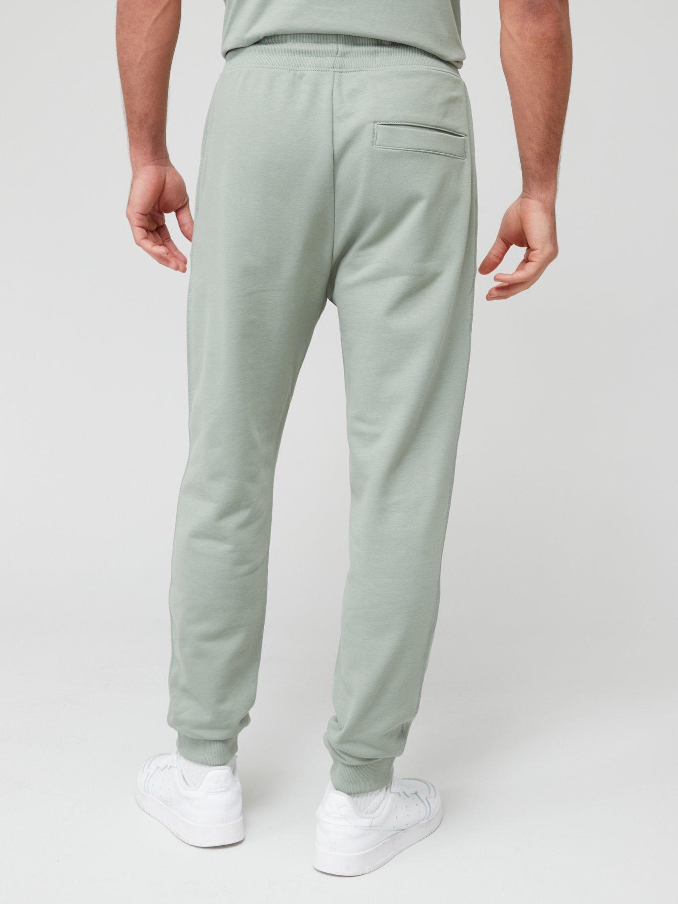 Nsw club fleece jogger pistachio frost whit hot sale