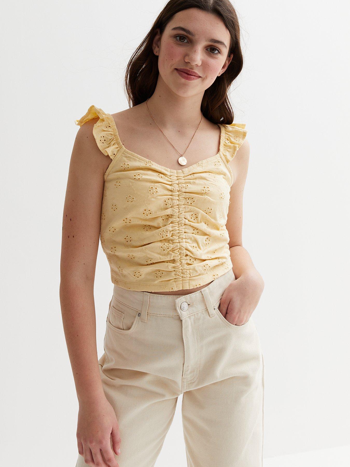 Pale yellow shop vest top