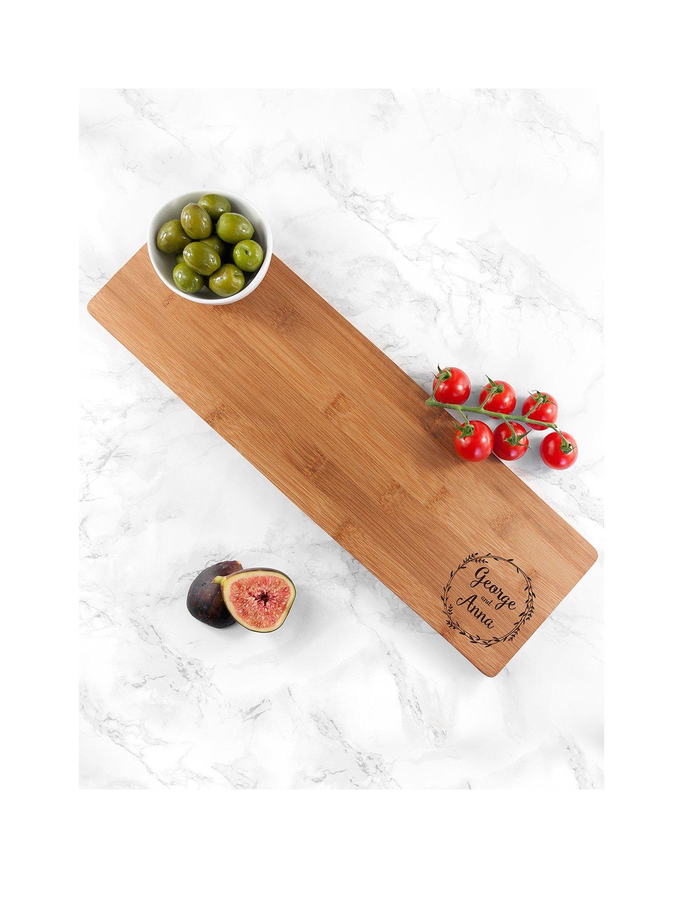 Product photograph of Treat Republic Personalised Couple S Wreath Design Serving Board from very.co.uk