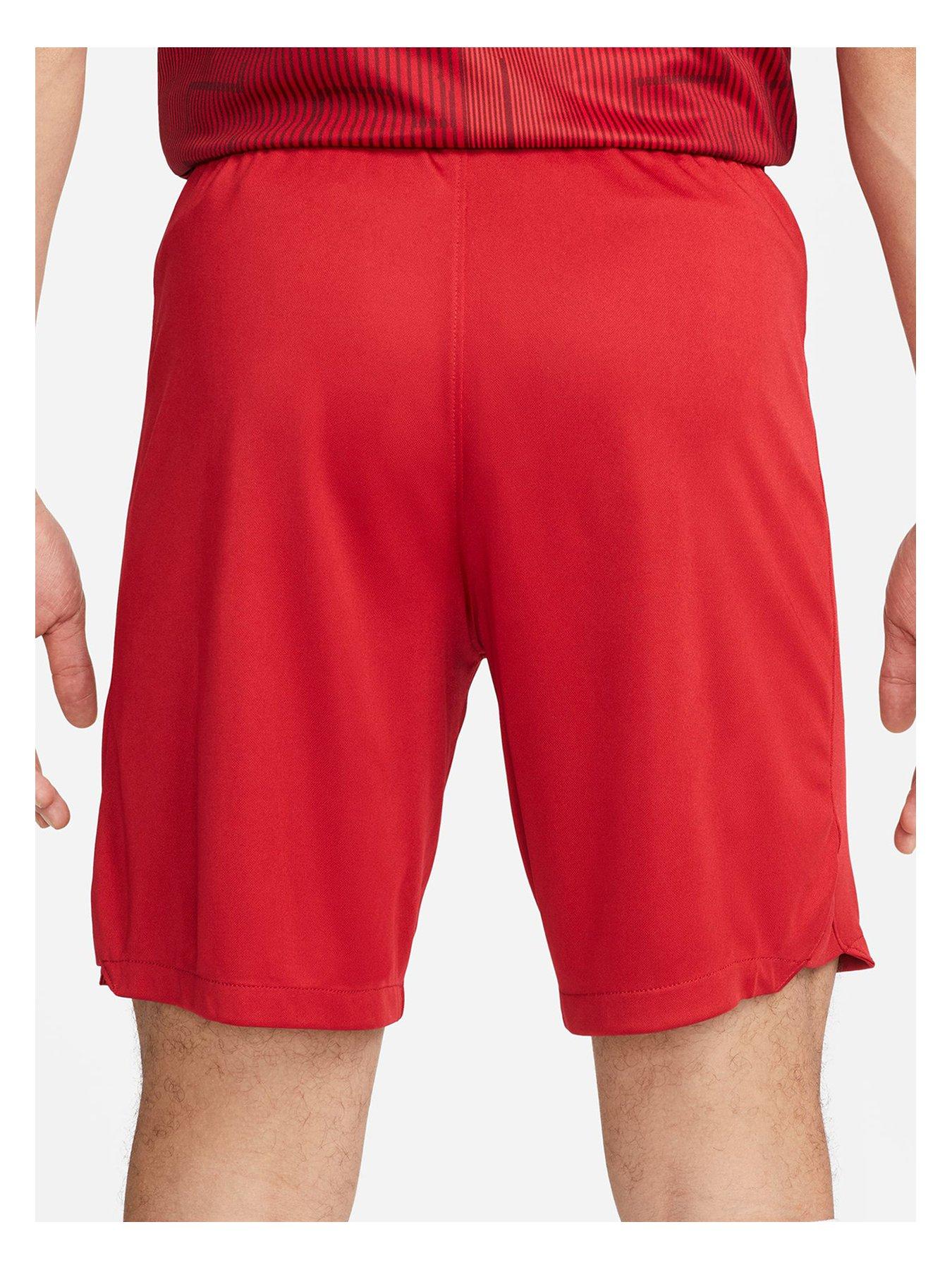 men red nike shorts