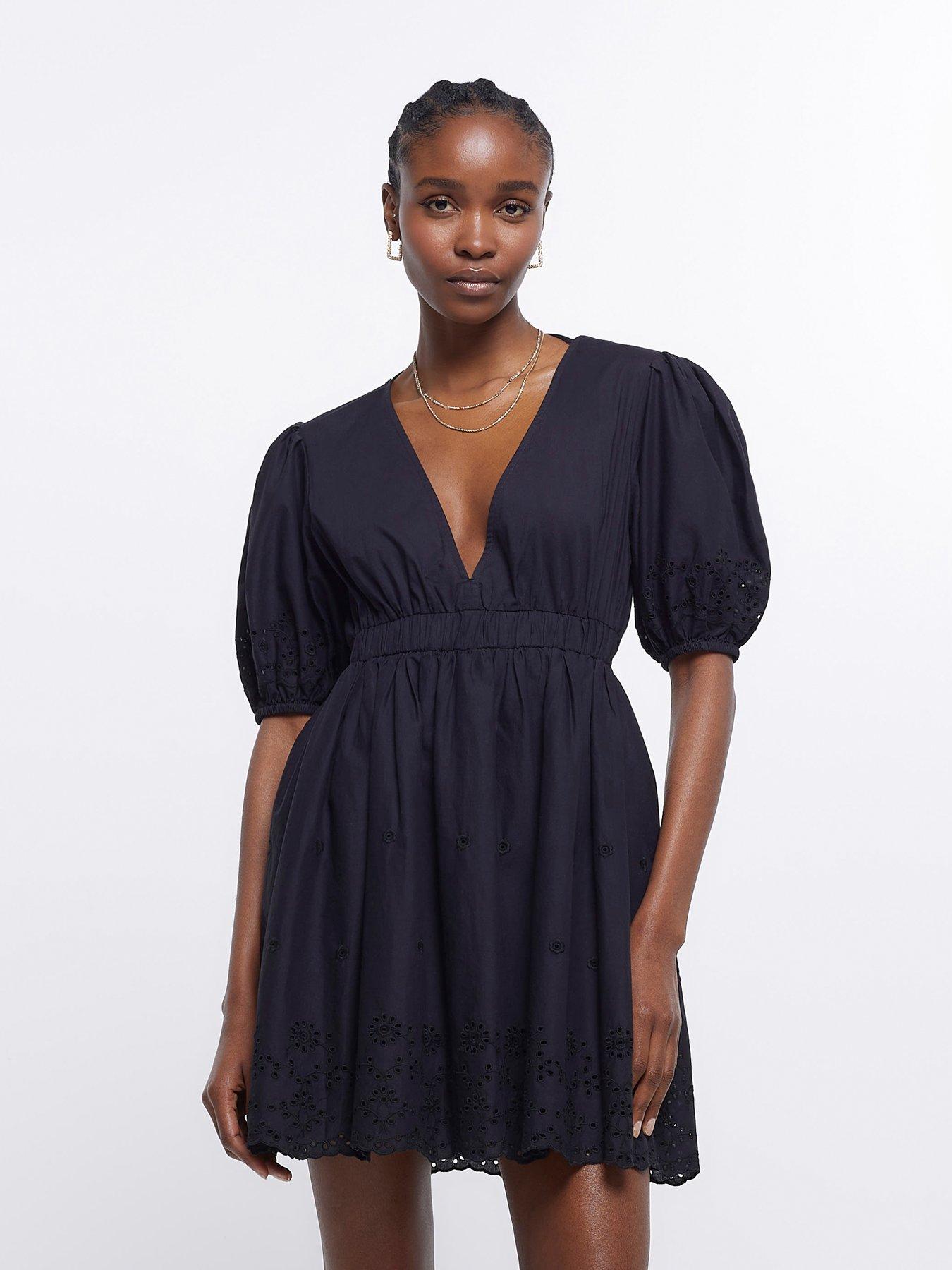 women skater black dress