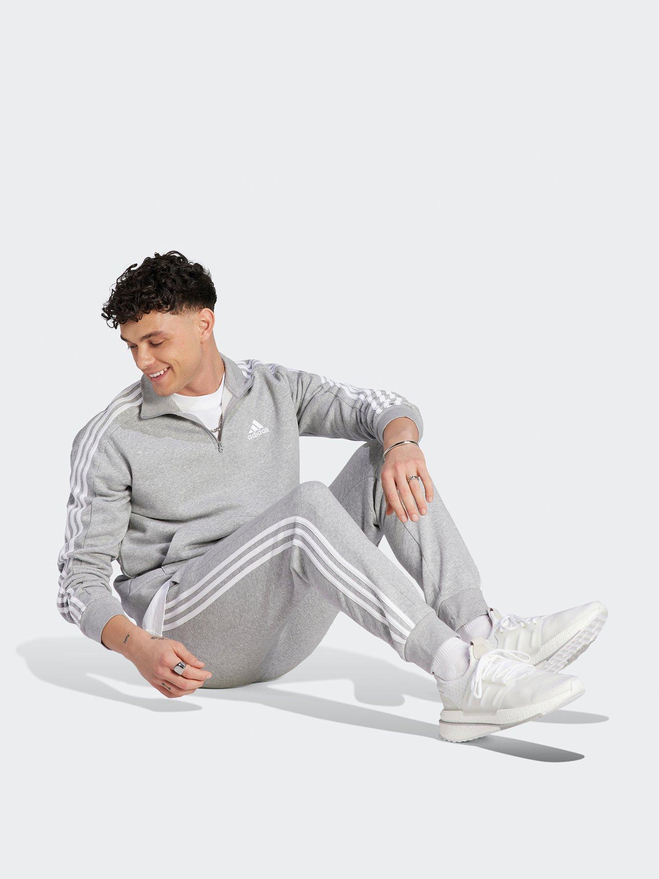 Adidas originals best sale essential tracksuit grey