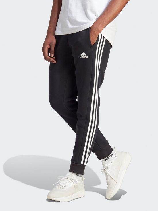 front image of adidas-mens-essentials-joggers-blackwhite