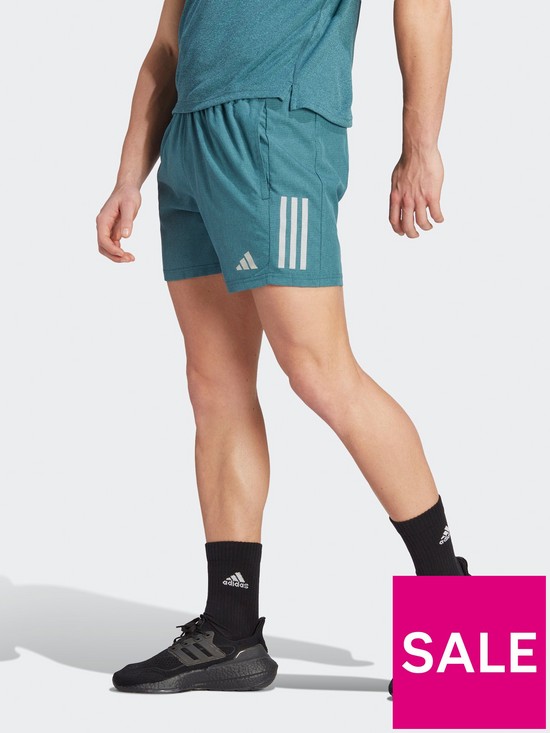 front image of adidas-mens-own-the-run-heather-running-short-blue