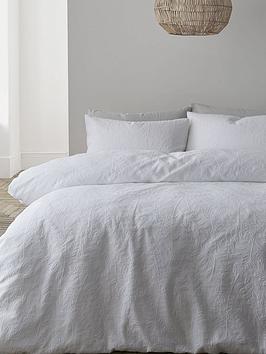 Product photograph of Bianca Matelass Leaves Duvet Cover Set - White from very.co.uk