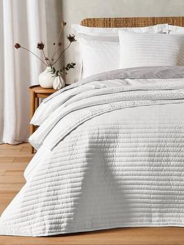 Product photograph of Bianca Quilted Lines Bedspread Throw In White from very.co.uk
