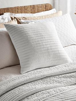 Product photograph of Bianca Quilted Lines Filled Cushion In White from very.co.uk