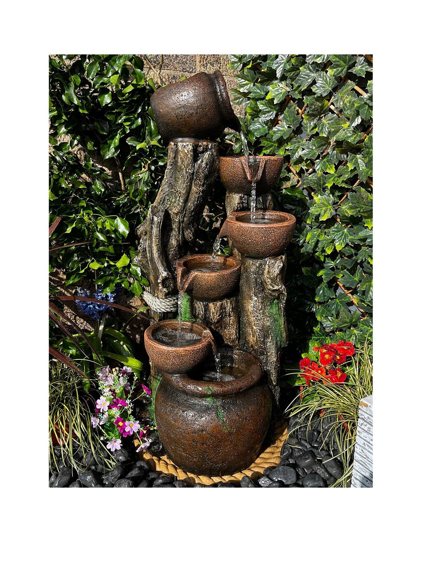 Product photograph of Tranquility 6 Flowing Jugs Mains Powered Water Feature from very.co.uk