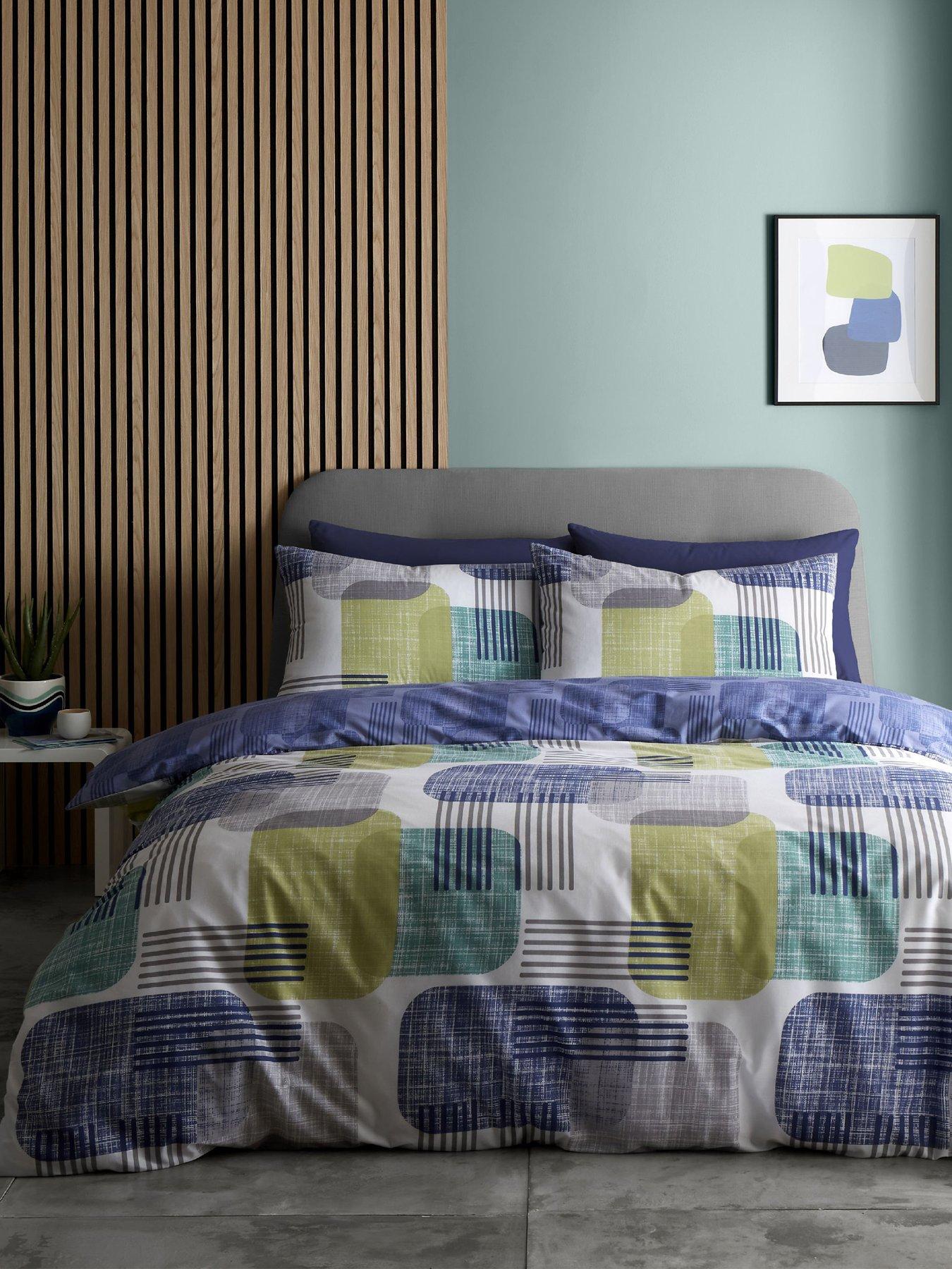 Product photograph of Catherine Lansfield Layered Geo Duvet Cover Set - Navy from very.co.uk