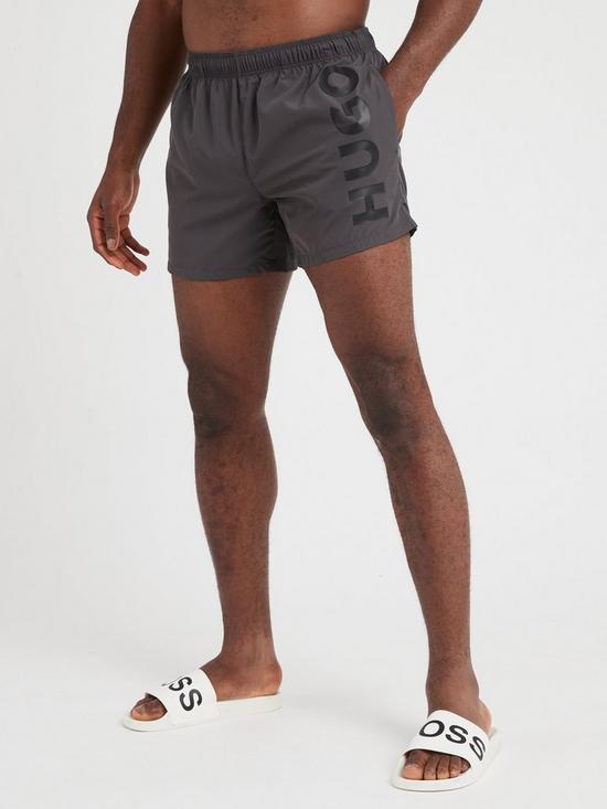 front image of hugo-abas-swim-shorts-dark-grey