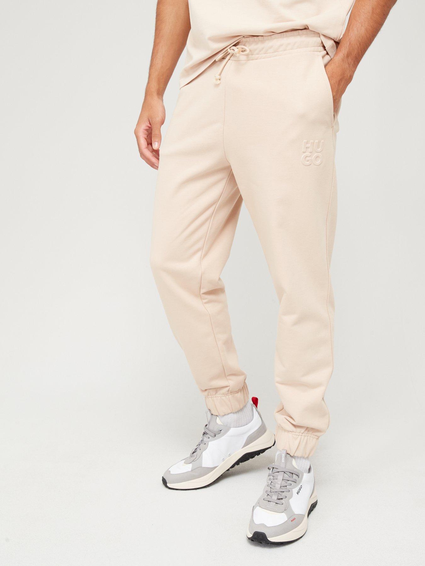 Beige joggers on sale