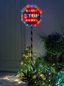 Product photograph of 110 Cm Santa Stop Sign With Multi Coloured Lights Outdoor Christmas Decoration from very.co.uk