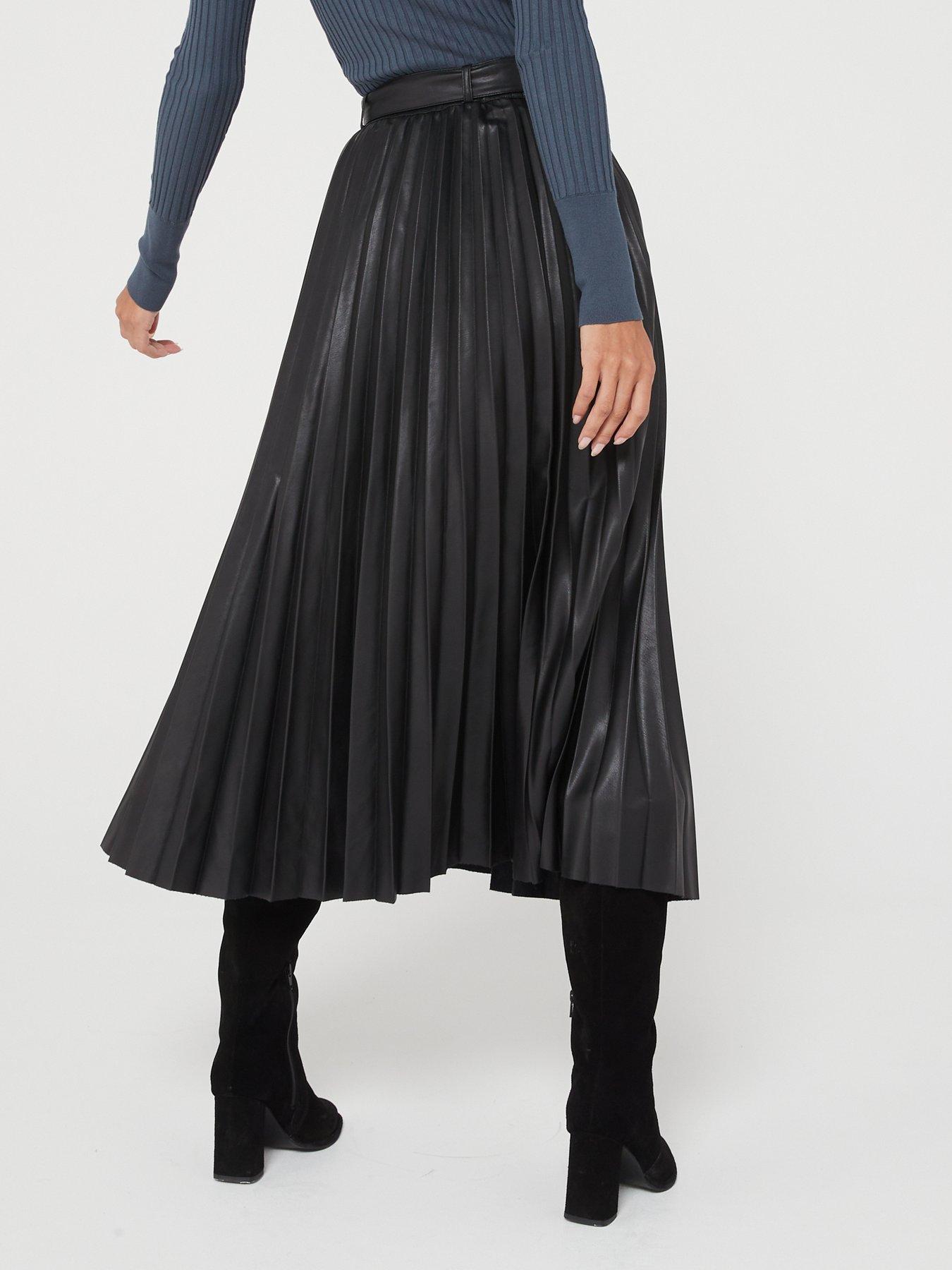 Black pleated midi 2025 skirt 7 little words