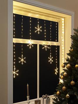 Product photograph of Very Home Warm White Snowflake Christmas Curtain Light from very.co.uk