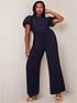  image of chi-chi-london-flutter-sleeve-lace-wide-leg-jumpsuit-in-navy