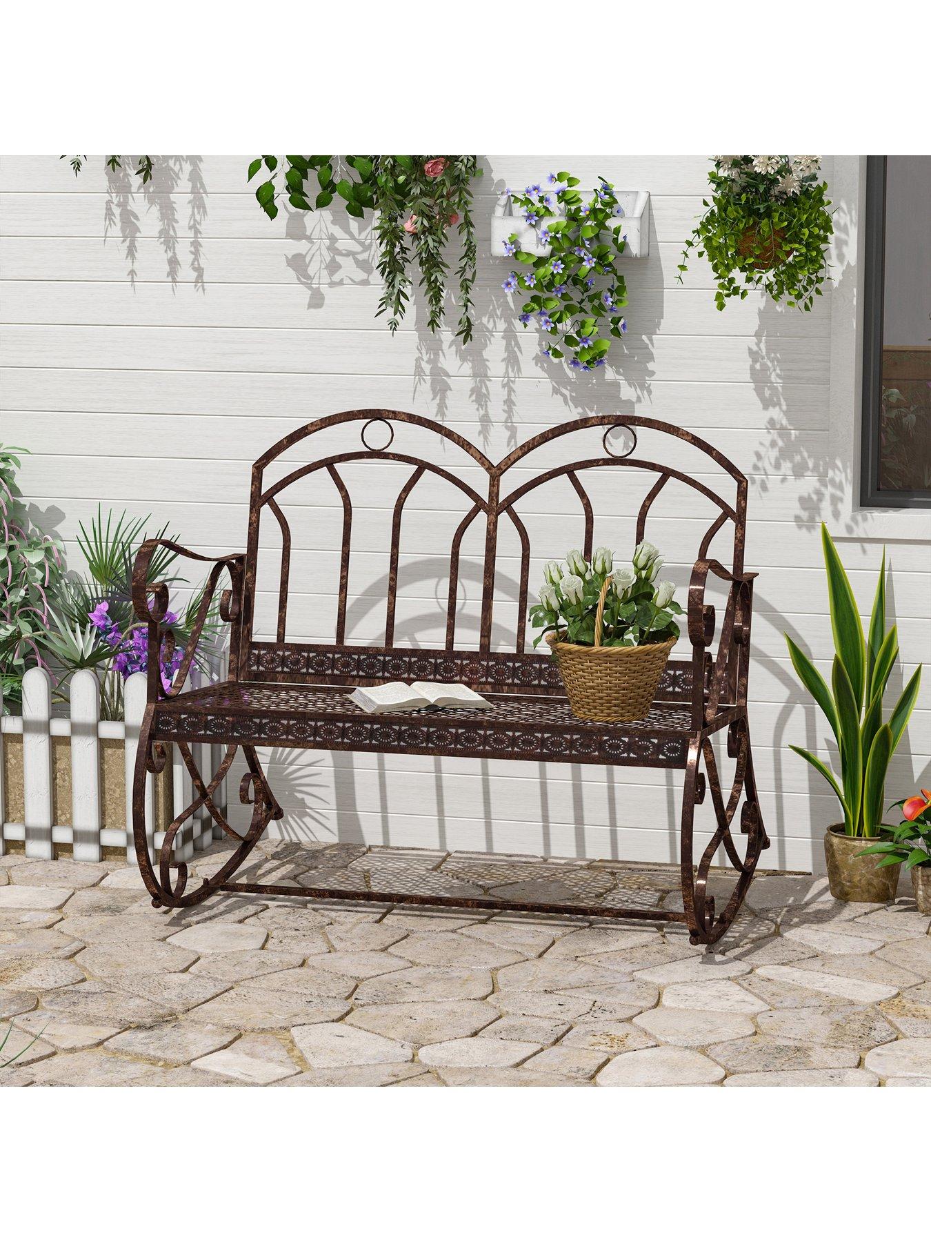 Wrought iron rocking store chair