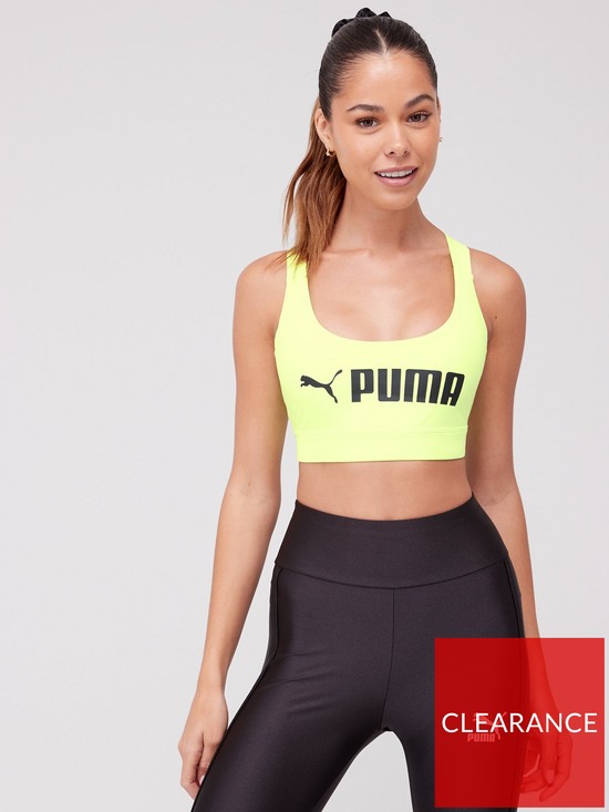 front image of puma-womens-mid-impact-womens-fit-bra-green