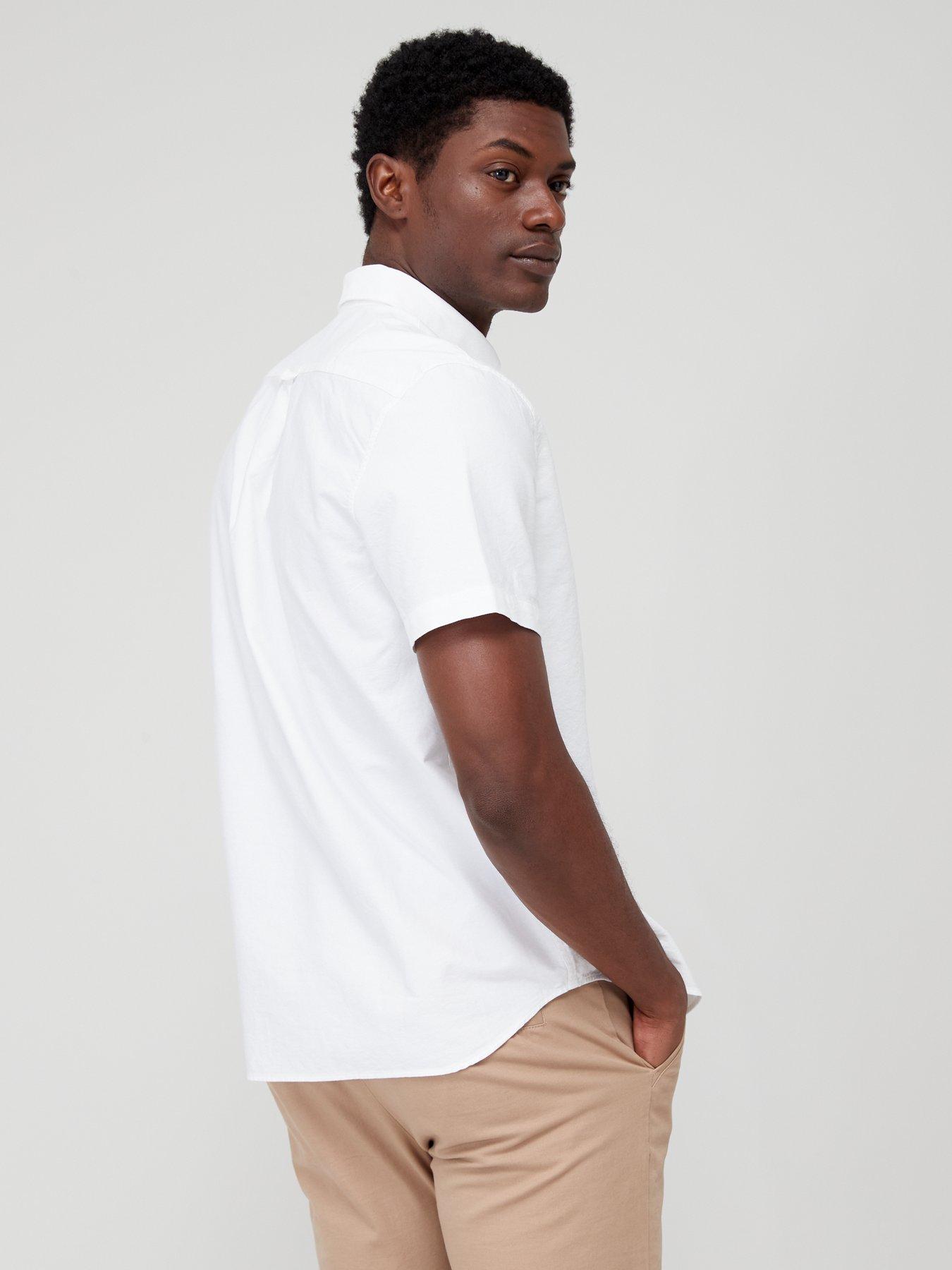 White short sale sleeve lacoste shirt