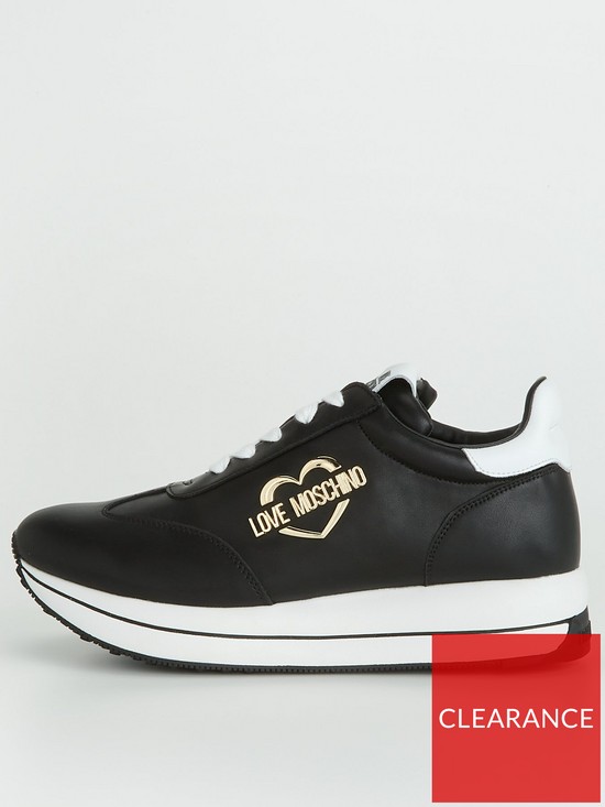 front image of love-moschino-metal-heart-logo-platform-trainers-black