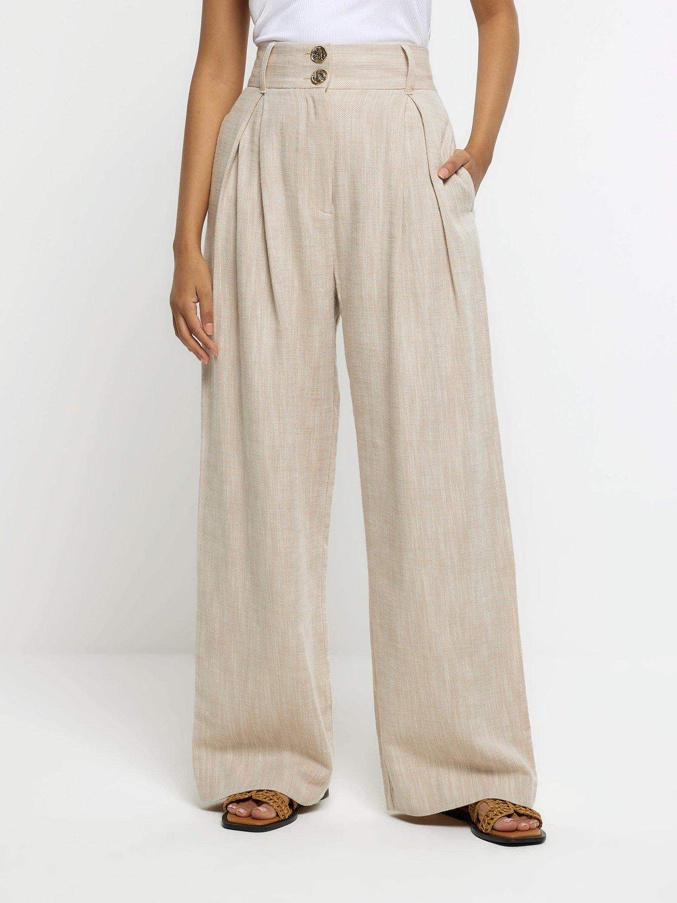 Beige wide leg pleated trousers