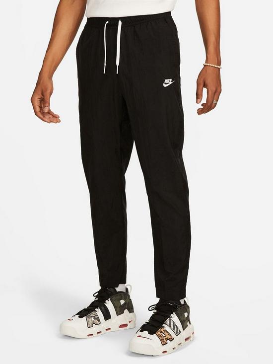 front image of nike-club-woven-lightweight-pants-black