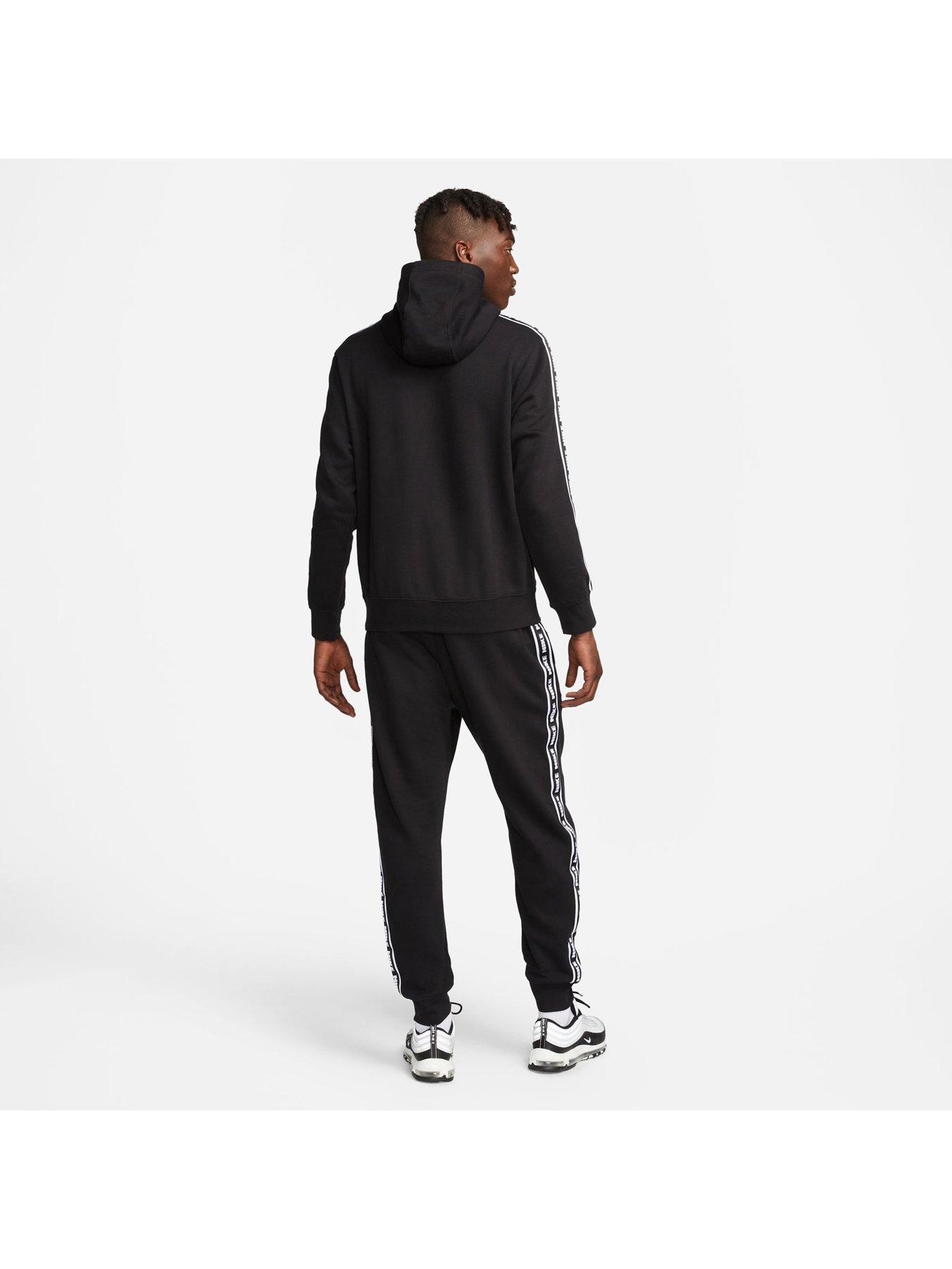 Nike club best sale logo tracksuit black