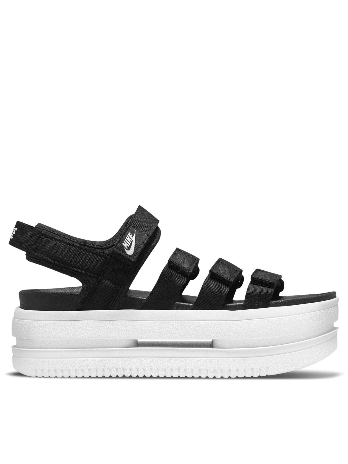 Nike black deals and white sandals