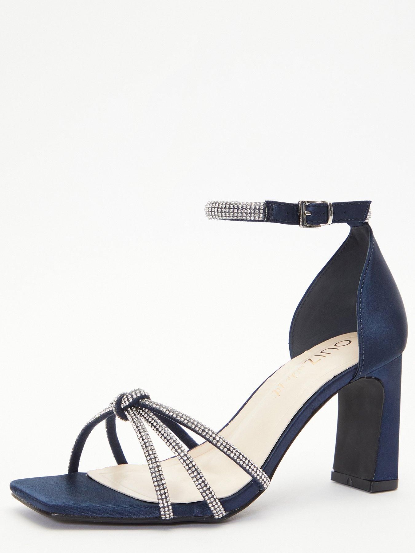 Navy blue store and silver sandals