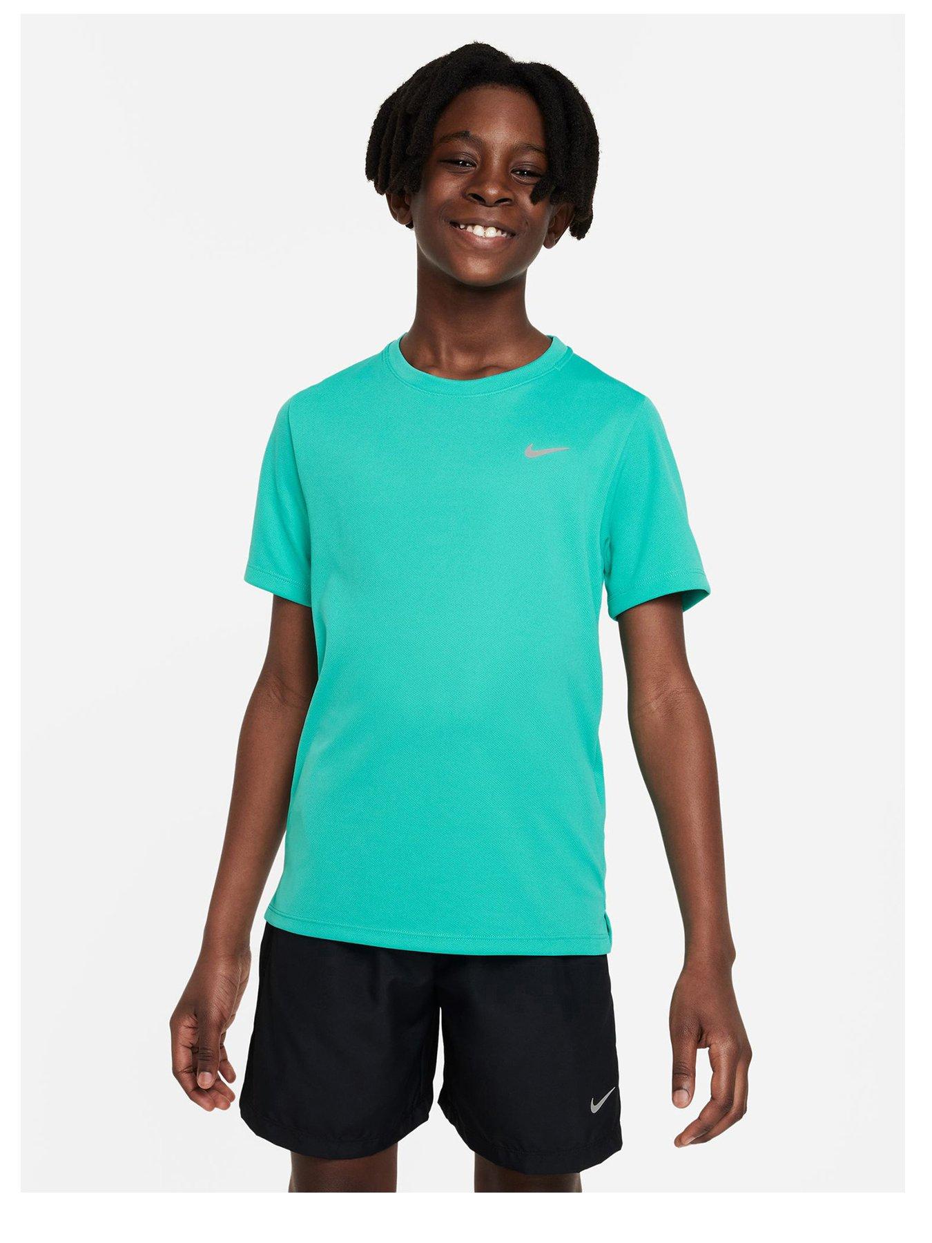 green and blue nike shirt