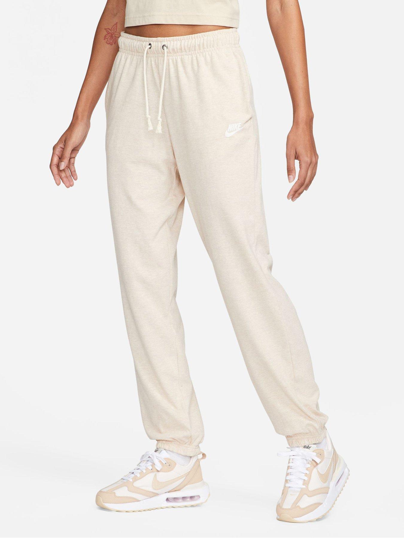 Nike beige hot sale pants