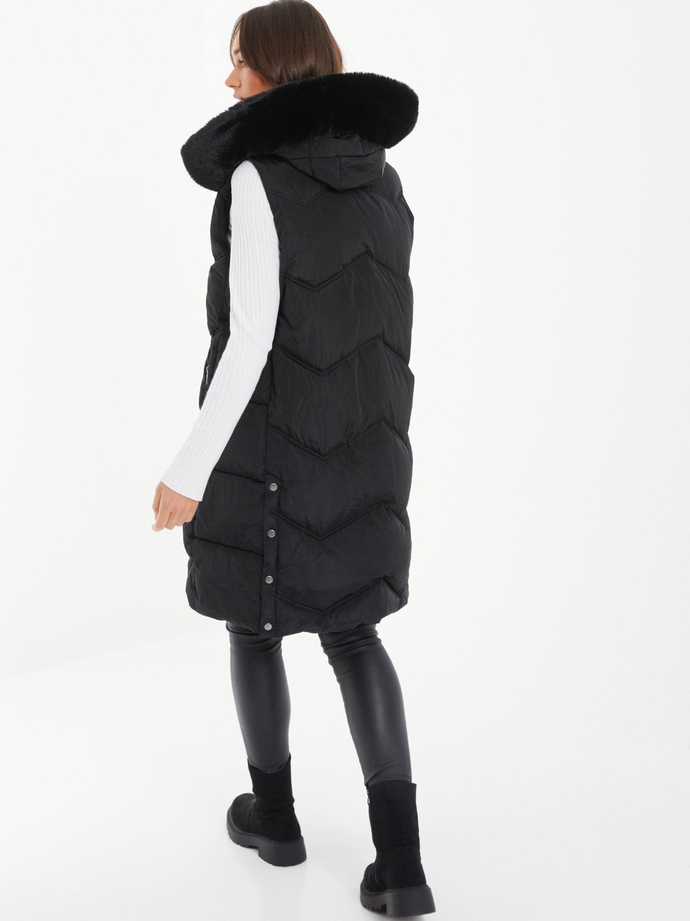 Black body warmer with top fur hood