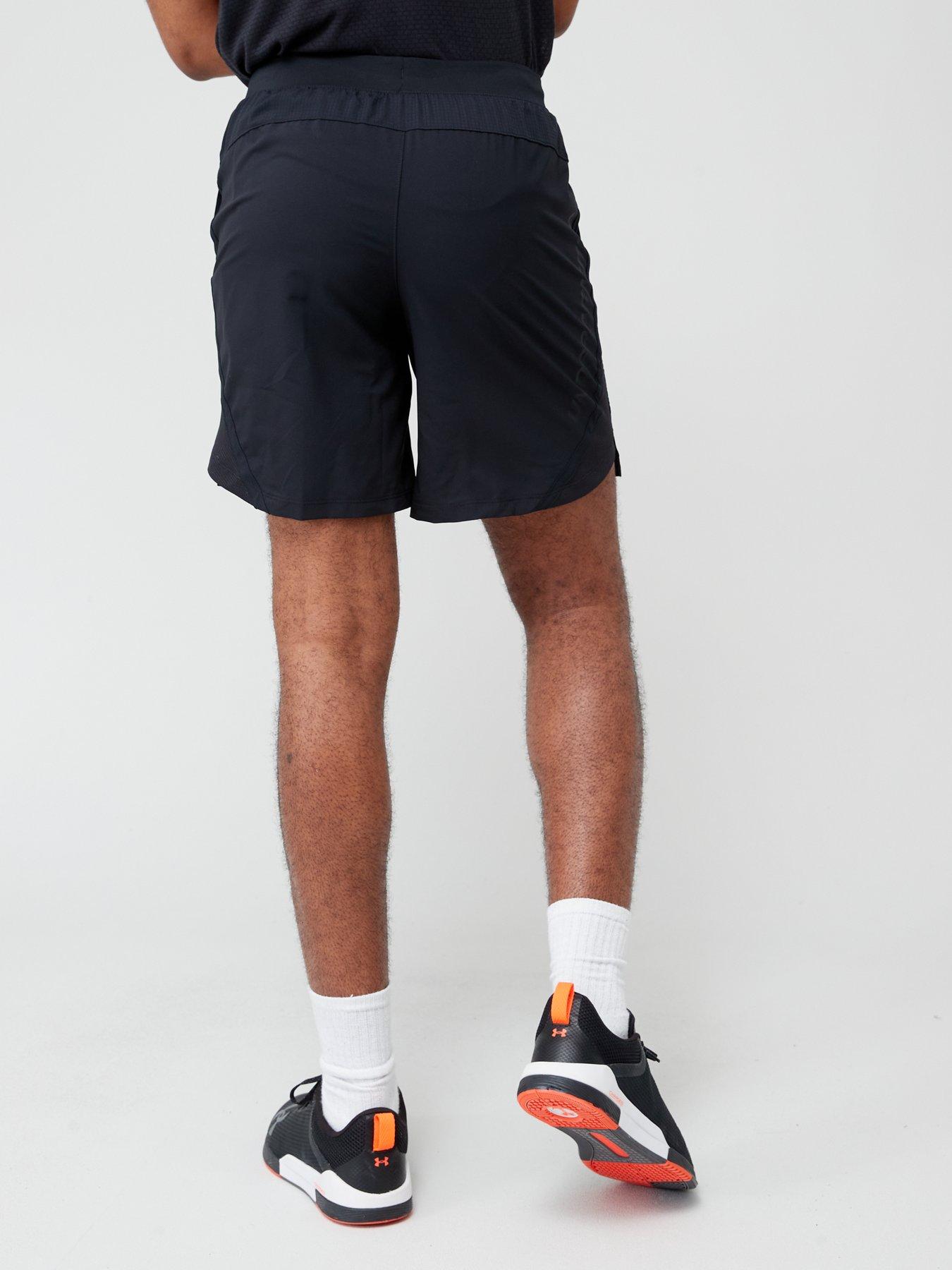 Under Armour Challenger shorts with side stripe in black