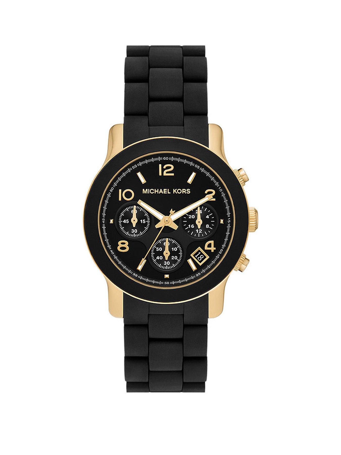 Product photograph of Michael Kors Runway Black Chronograph Gold Tone Case Black Silicone Bracelet Ladies Watch from very.co.uk