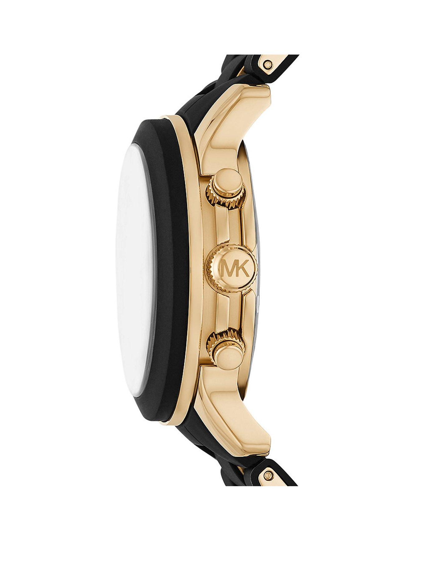 Gold tone case black silicone 2024 watch