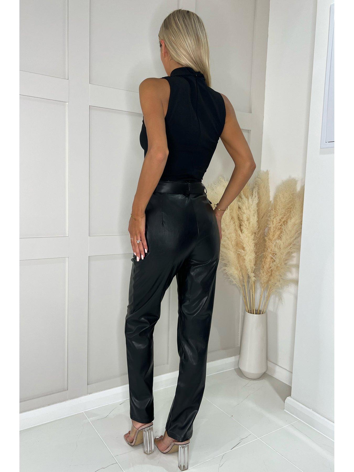 Parisian faux leather belted long sleeve jumpsuit in black