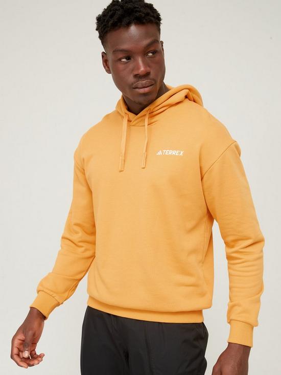 front image of adidas-terrex-mens-logo-hoodie-yellow