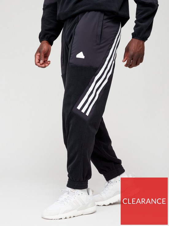 front image of adidas-future-icons-3-stripe-pants-black