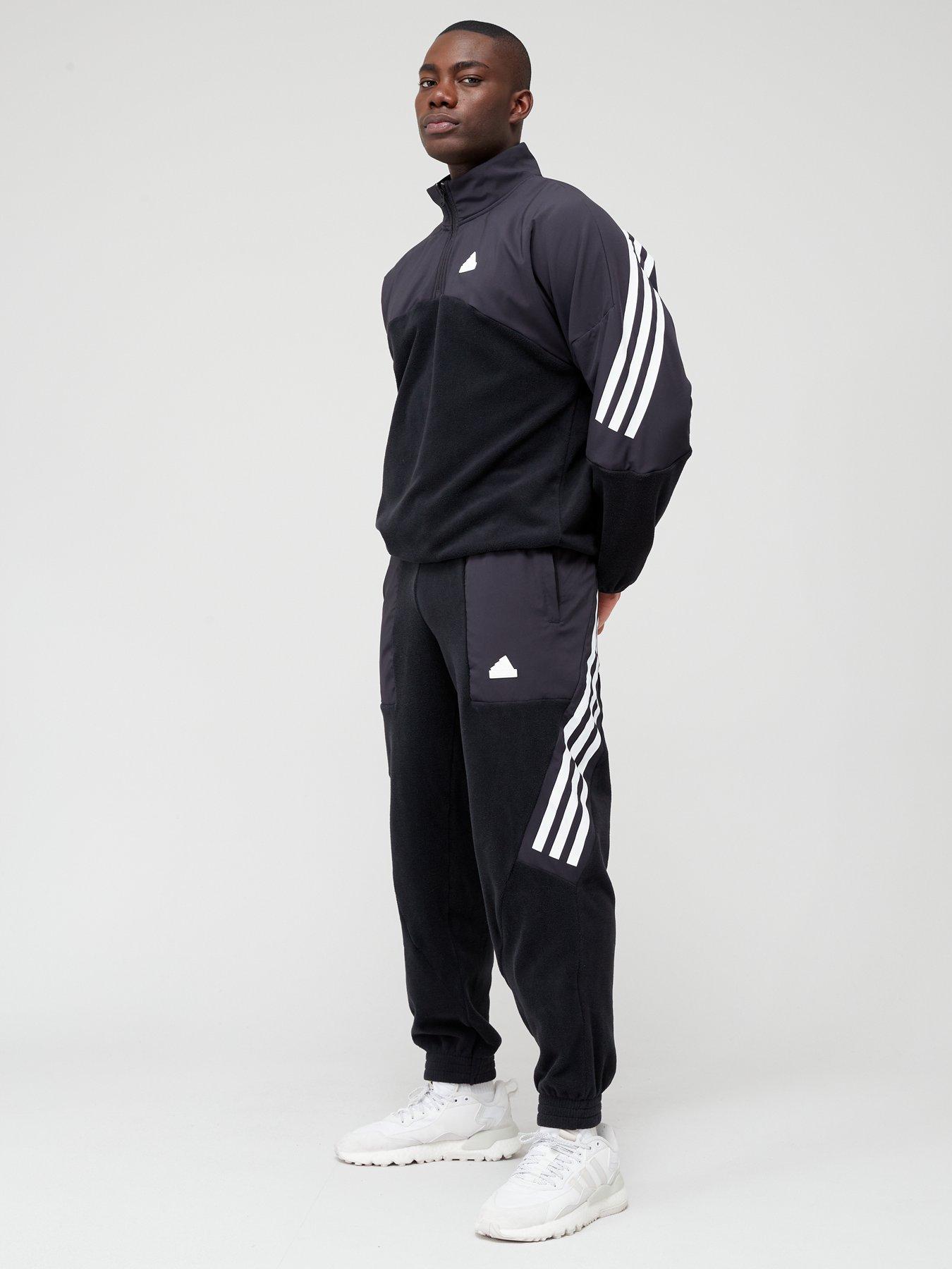 Adidas pants with 2024 stripe on back