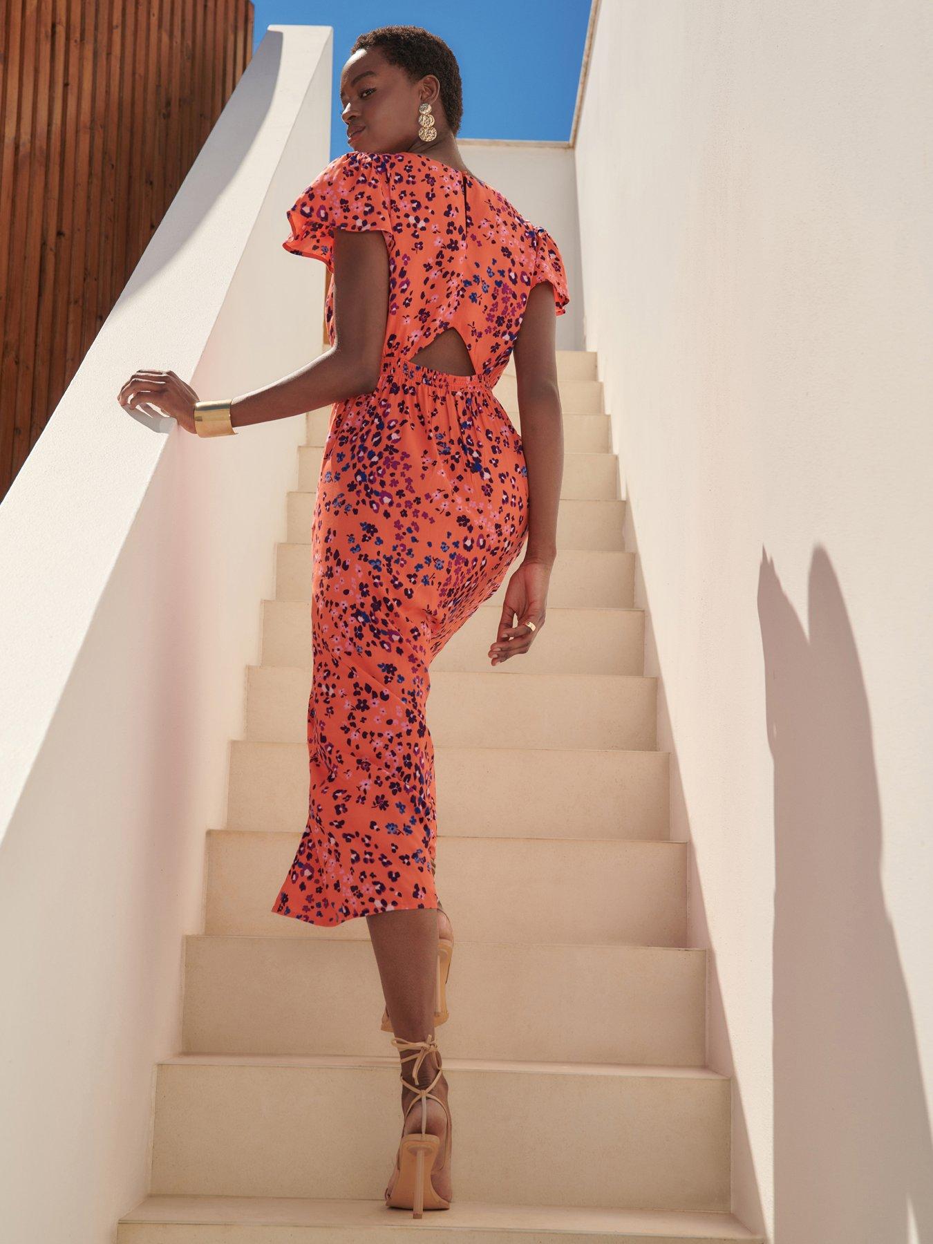 Orange animal print dress sales