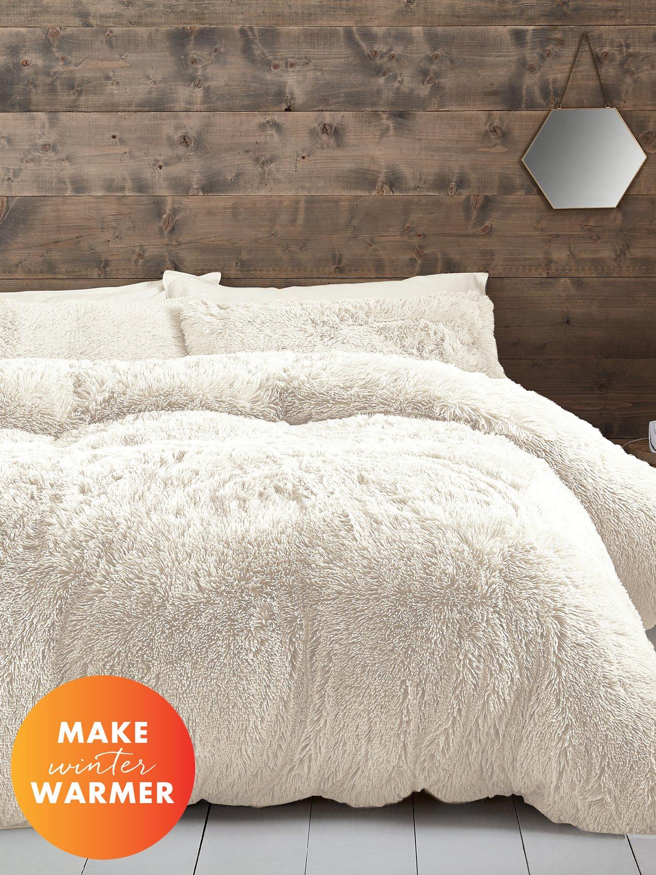 Product photograph of Catherine Lansfield Cuddly Faux Fur Duvet Cover Set In Cream from very.co.uk