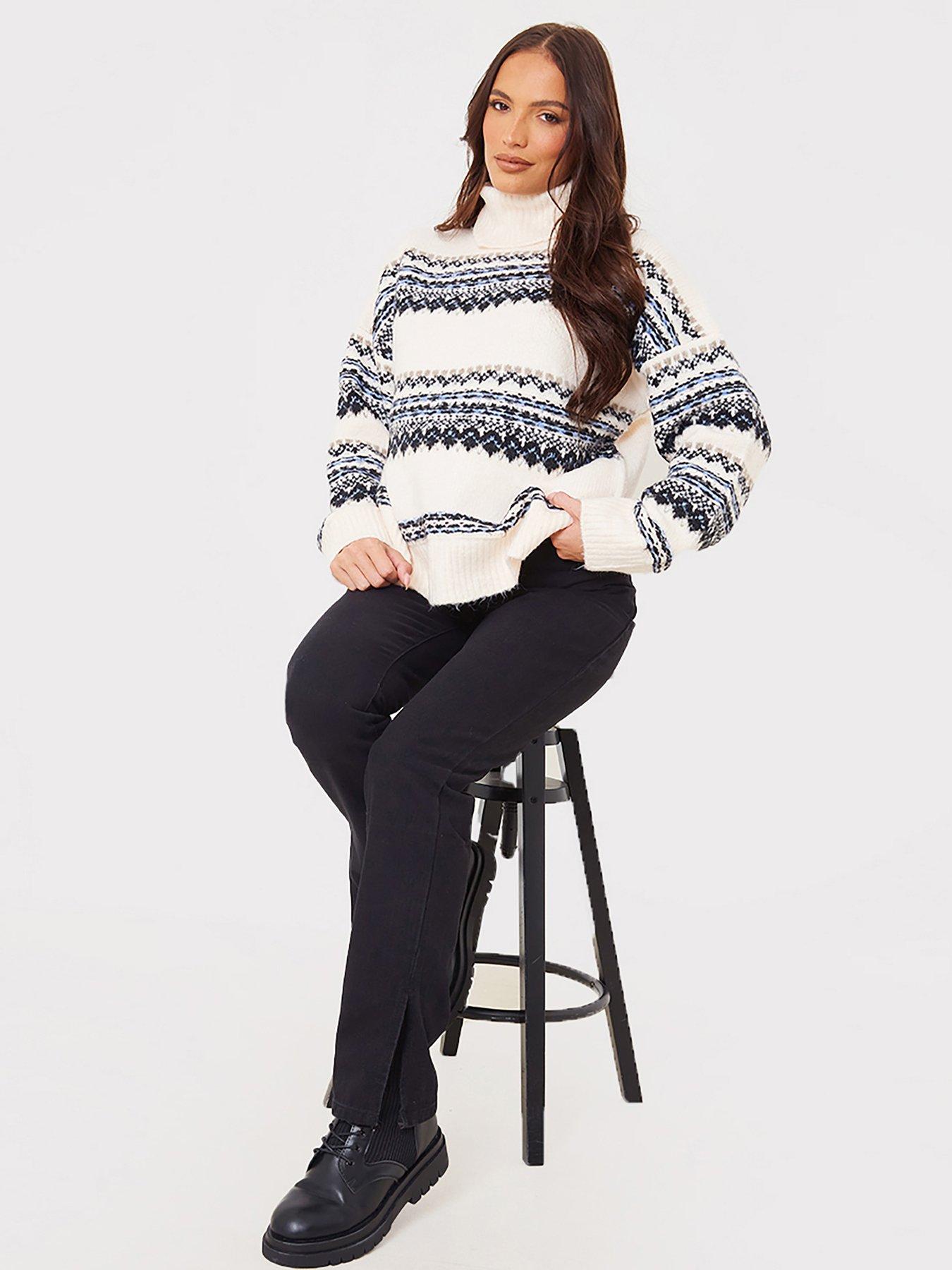 Fluffy roll neck outlet jumper