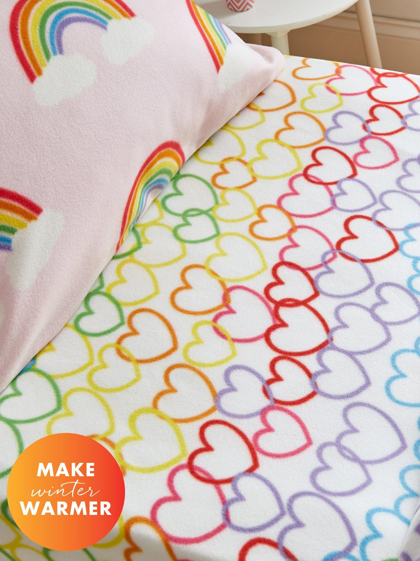 Product photograph of Catherine Lansfield Rainbow Hearts Soft Cosy Fleece Fitted Sheet - Pink from very.co.uk