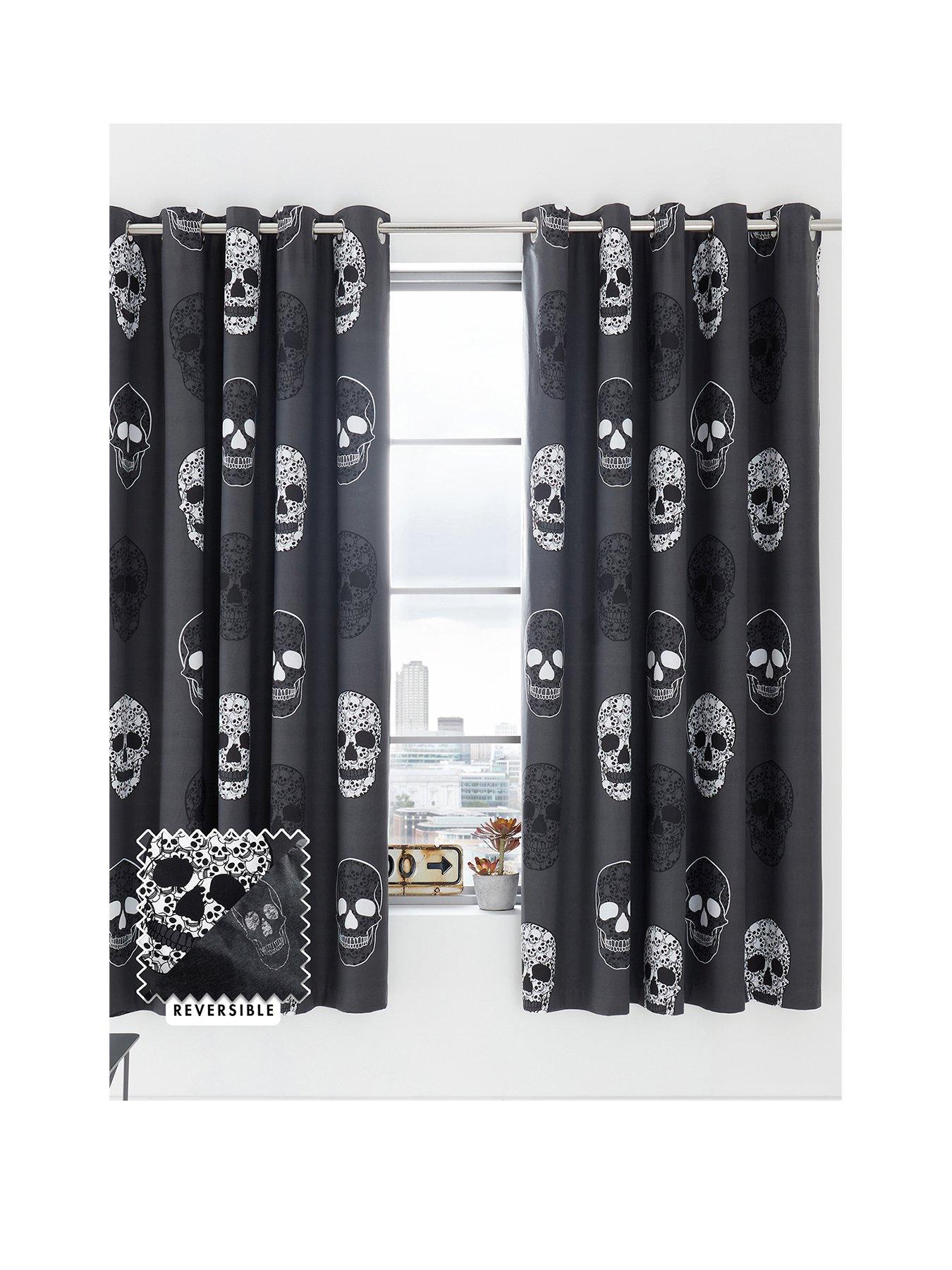 Product photograph of Catherine Lansfield Halloween Skulls Reversible Eyelet Curtains from very.co.uk