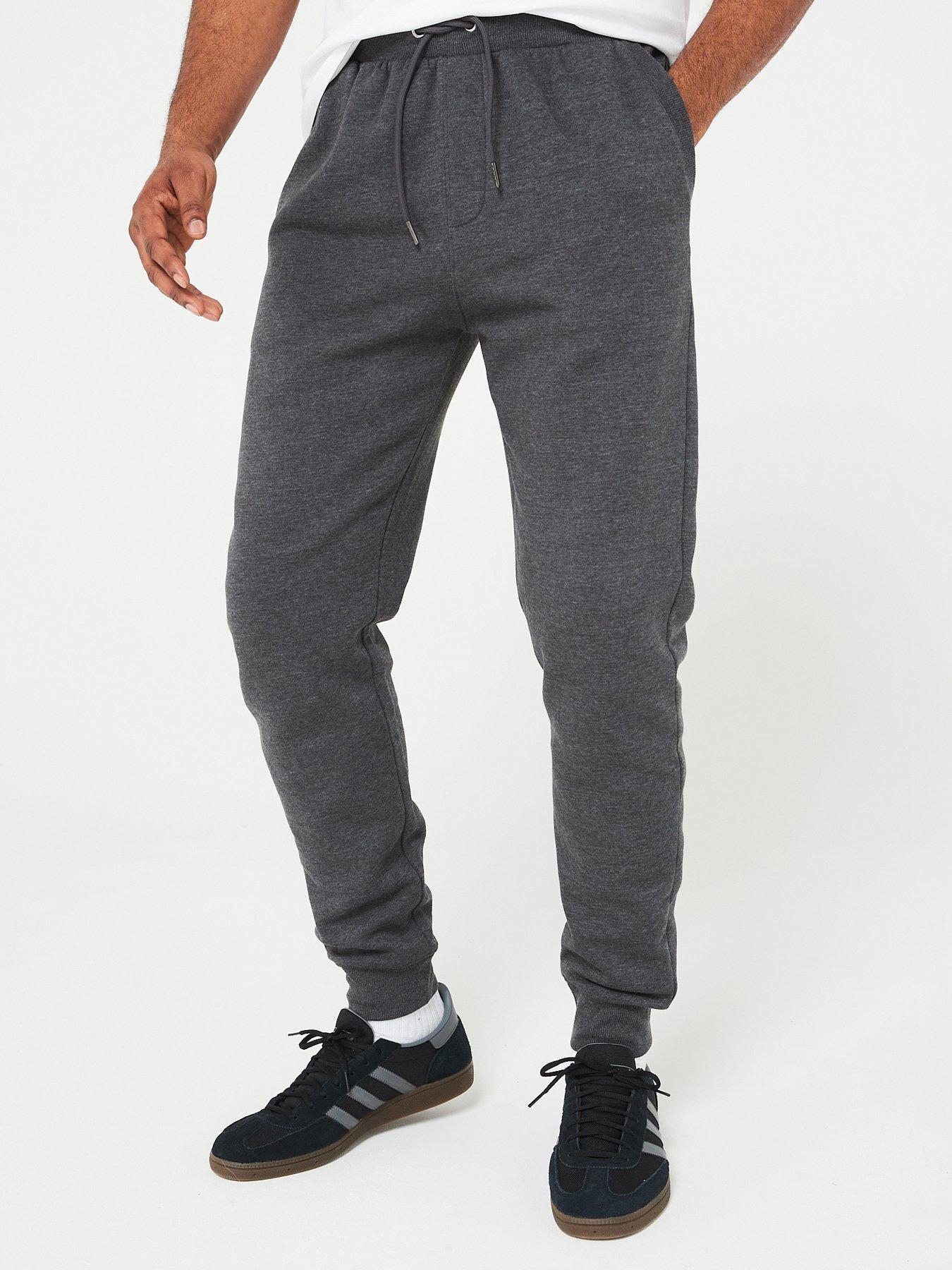 Man in grey joggers sale